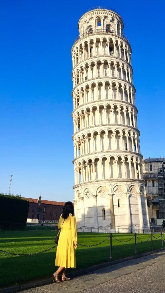 One day in Pisa - Bejal looking at leaning Tower of Pisa