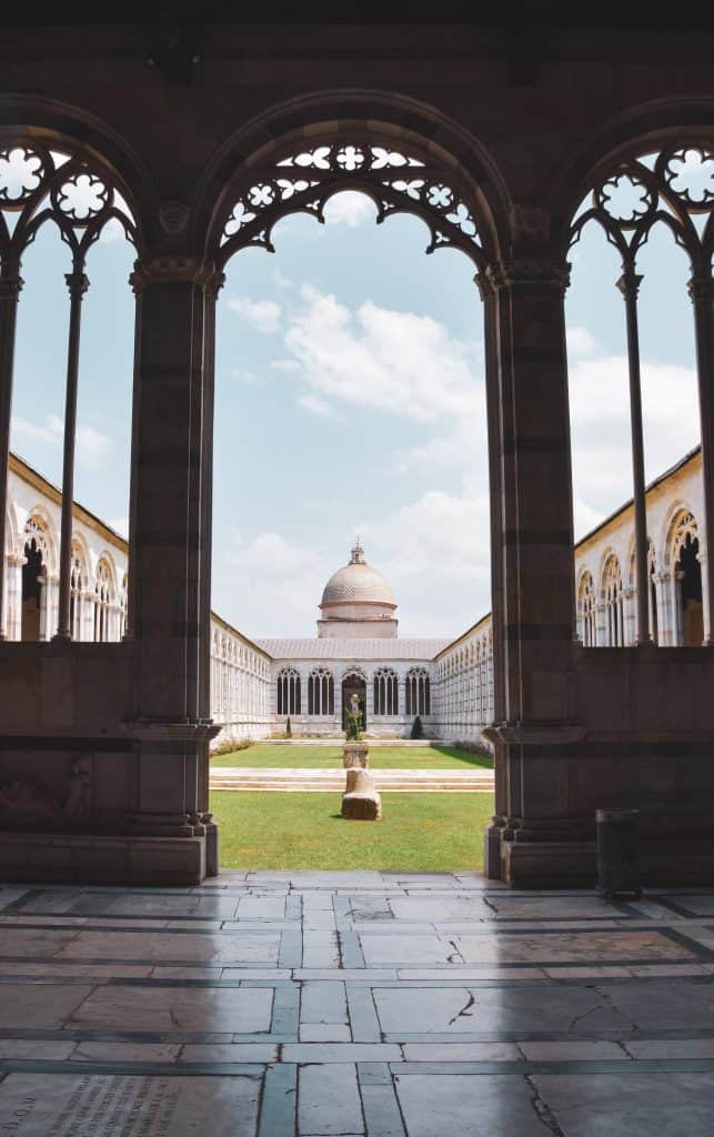 The Campasanto at Piazzale dei Miracoli through arched windows