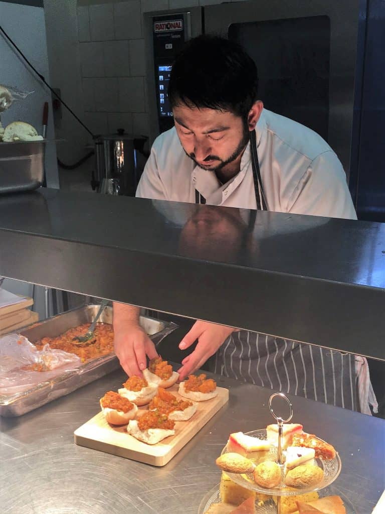 Chef Rishi preparing the pau bhaji in the kitchen