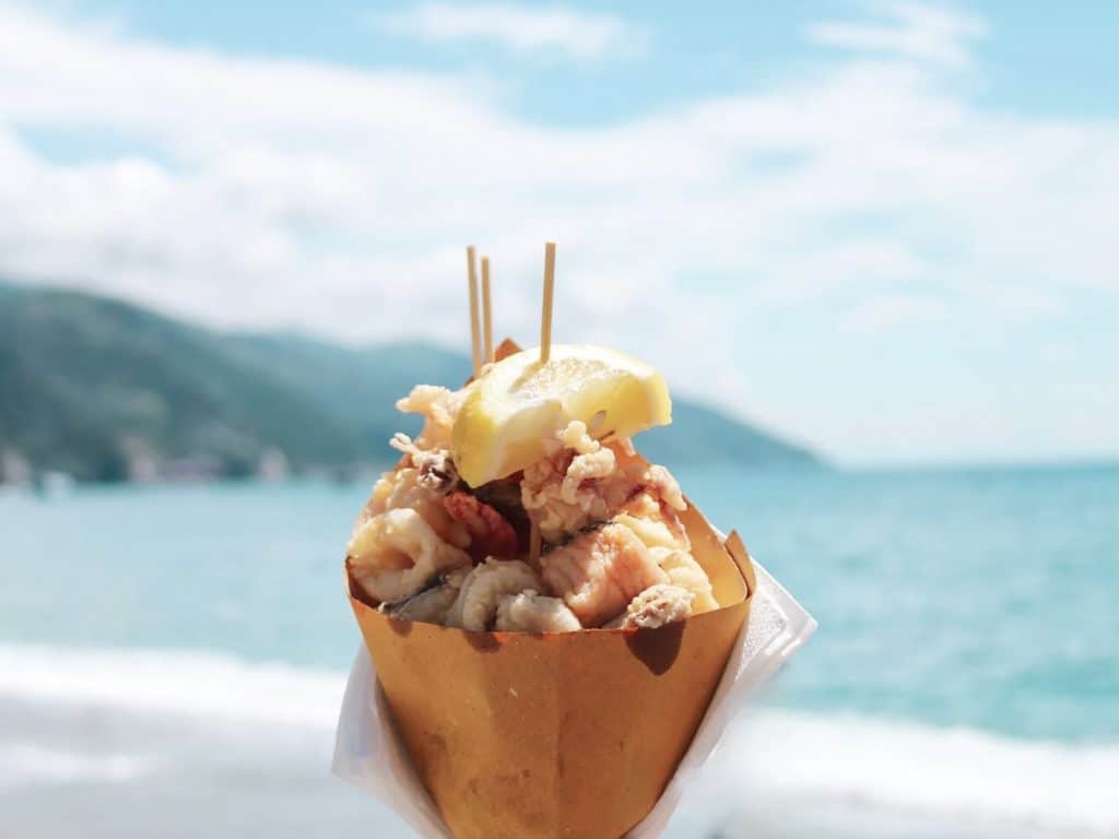 Tutti Fritti Fish fry cone, on the beach in Riomaggiore, Cinque Terre