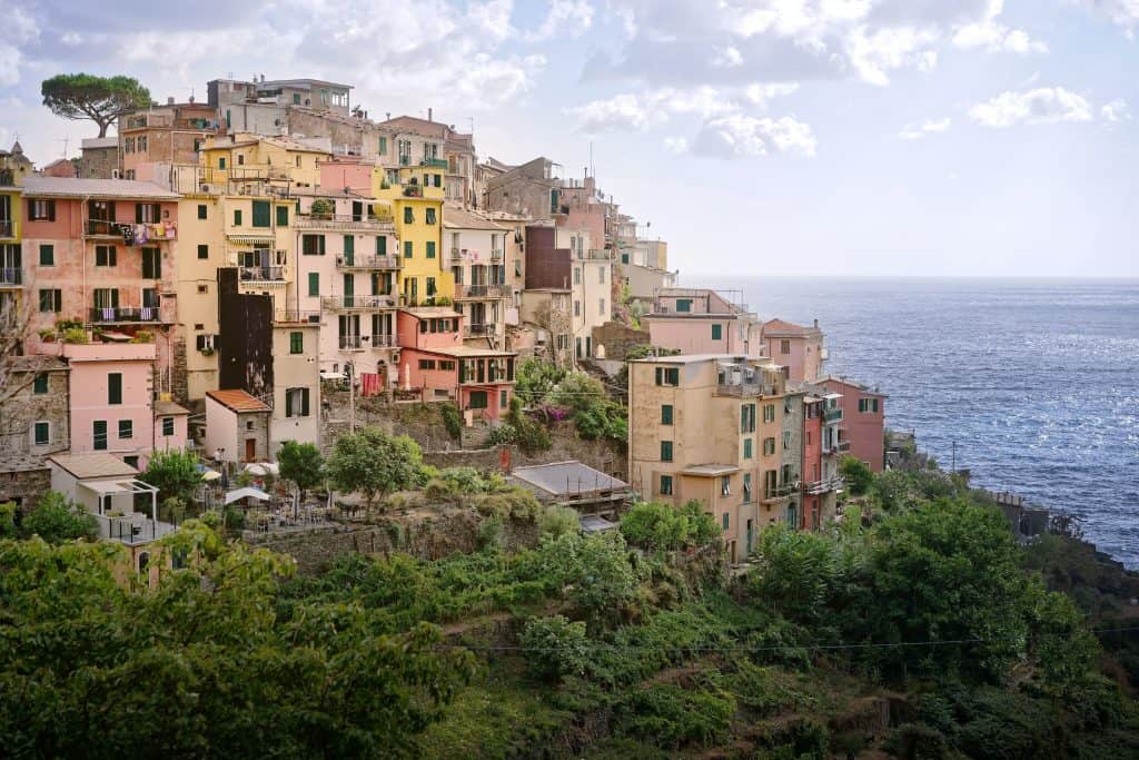 Manarola rocky coastline with colourful houses, Cinque Terre