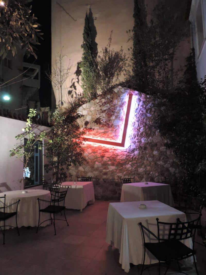 Elegant dining at 2 Michelin Star Spondi in Athens. Outdoor Terrace