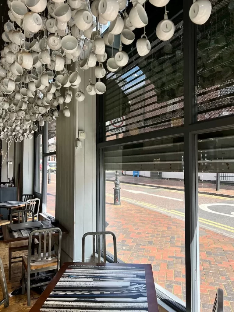hanging cups inside Madison's cafe, Leicester