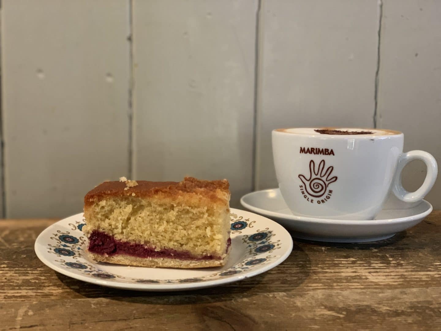Independent Coffee Shops in LE1, Leicester. Slice of cake and a coffee at Bread & Honey Cafe