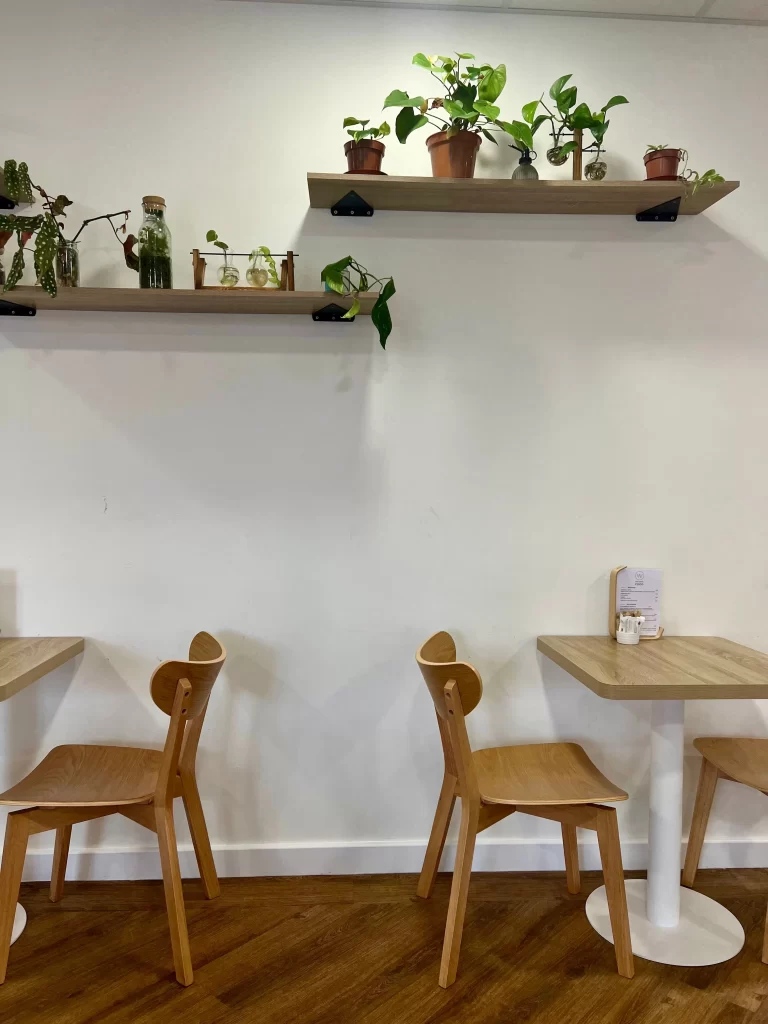 Tabels, chairs and seating area at Way Coffee at One Church, Leicester