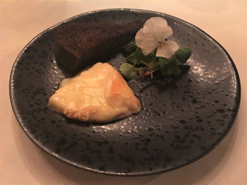 Elegant dining at 2 Michelin Star Spondi in Athens Saint Nectaire cheese with bitter salad