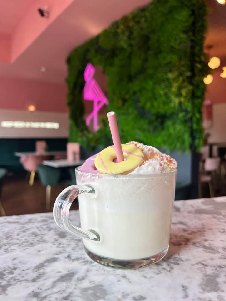 White chocolate hot chocolate with a yellow party ring at Audrey, Leicester