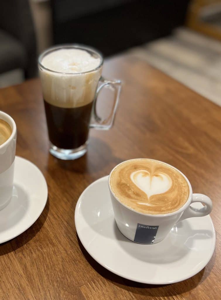 Freddo cappuccino with cinnamon and a latte at Greek Corner Bakery, Leicester