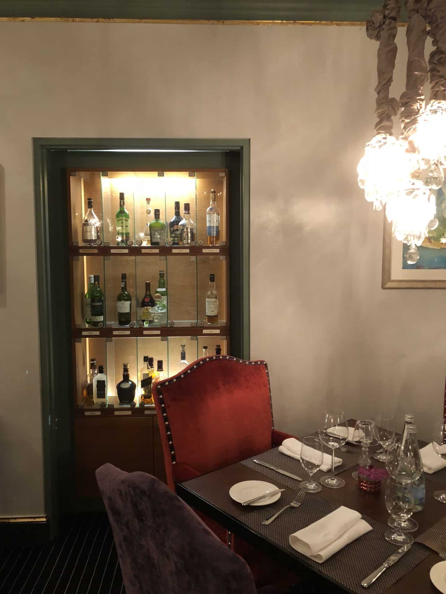 The Grand Palace Hotel Riga Pils Restaurant interior wuth hanging chandeliers 