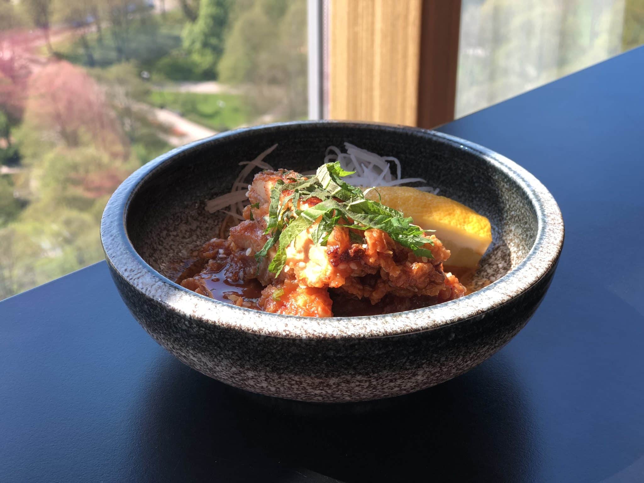 Vegetarian-friendly food in Riga, a potato and tomato sauce dish at Skyline Bar Riga