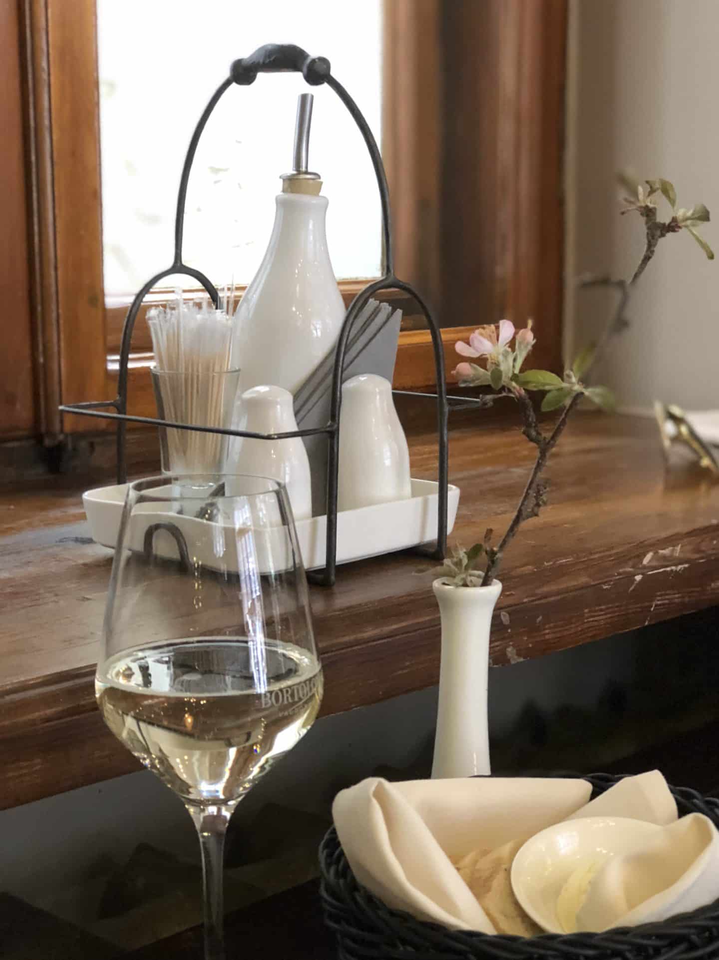 A glass of white wine at Domini Canes Restaurant, Riga