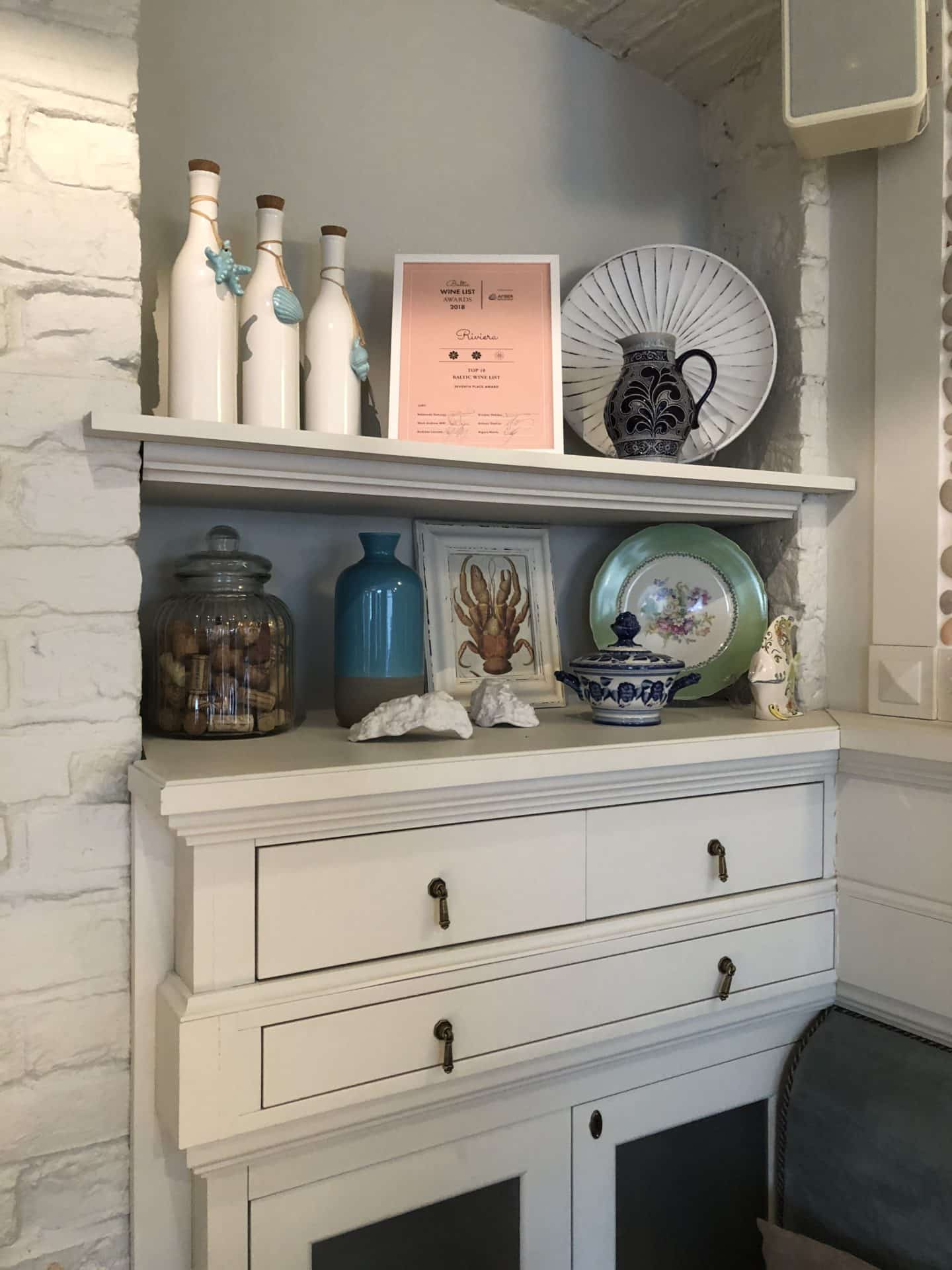 Vegetarian-friendly food in Riga: sideboard with artefacts at Riviera restaurant