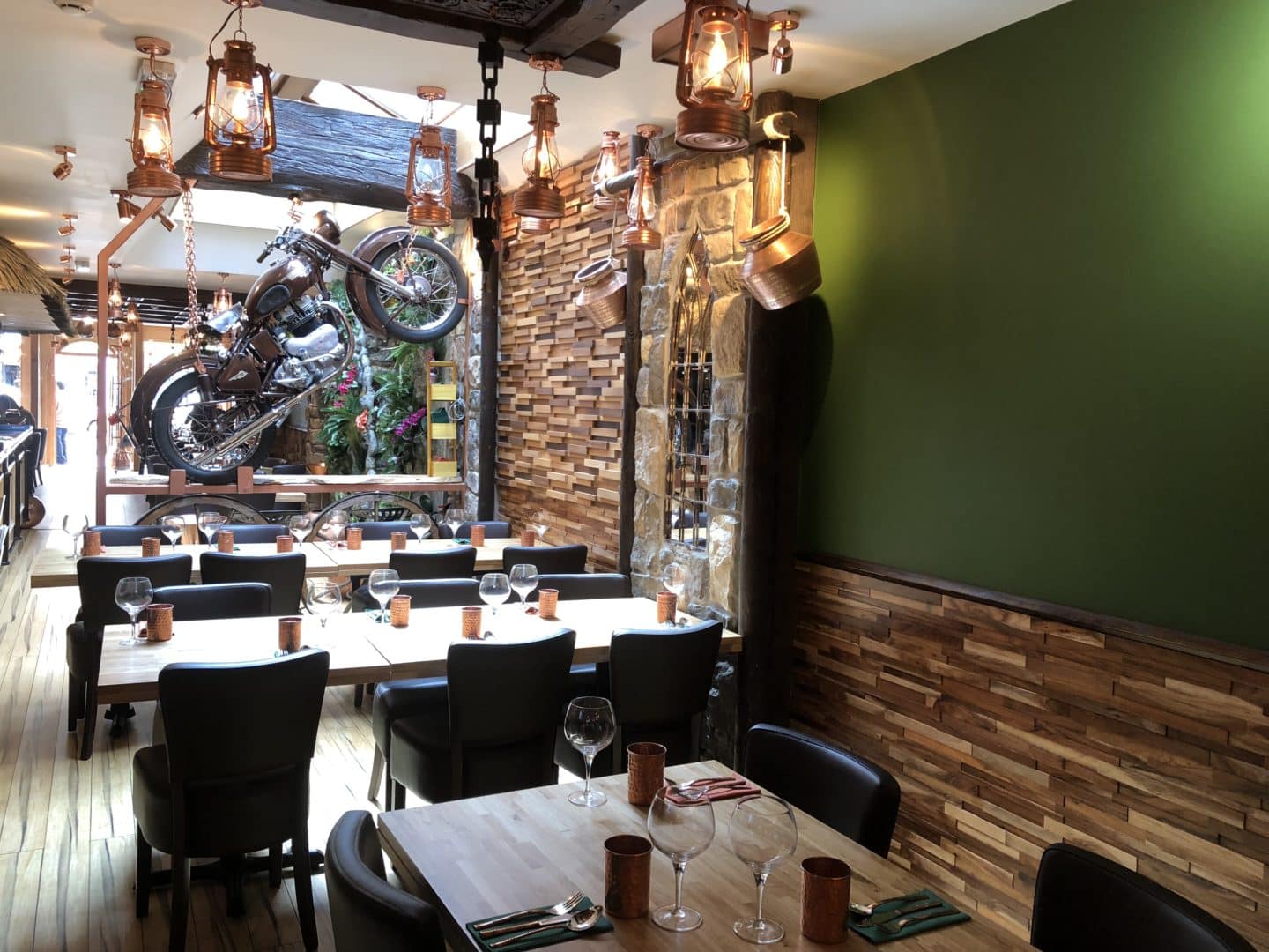 Vegetarian Keralan food at Herb Leicester. The interiors at Herb with the famous motorbike