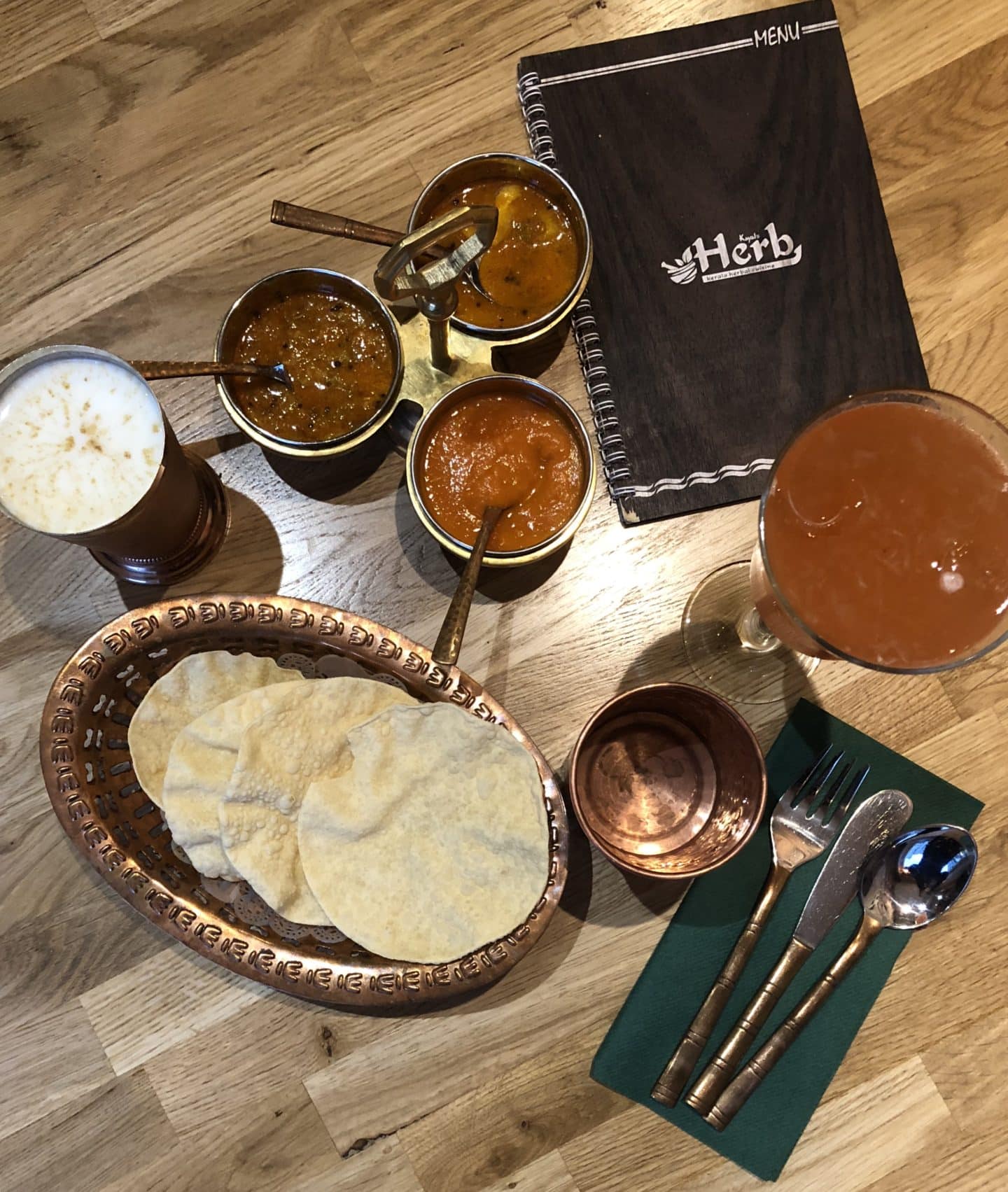 Vegetarian Keralan food at Herb Leicester.  Poppadoms and pickles flat lay