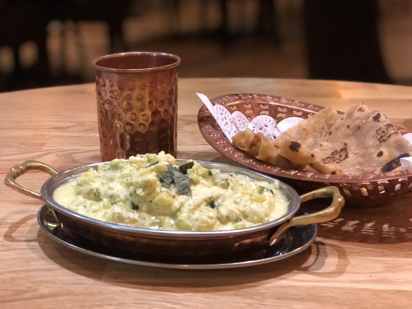 Vegetarian Keralan food at Herb Leicester.  Pavakka Pachadi with chappatis and a copper cup of water
