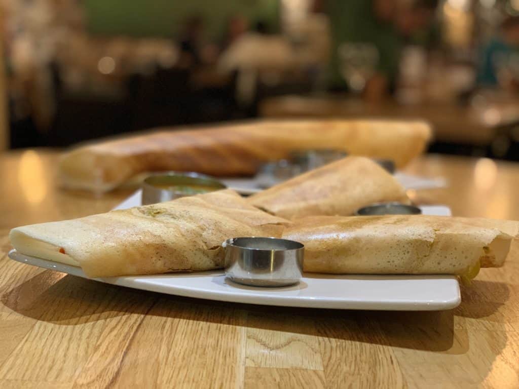 Vegetarian Keralan food at Herb Leicester, side view of the dosa with chutney