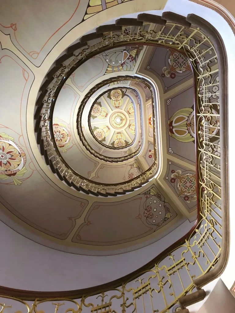 Art Nouveau Staircase aerial view from the top at the Art Nouveau Centre Museum 
