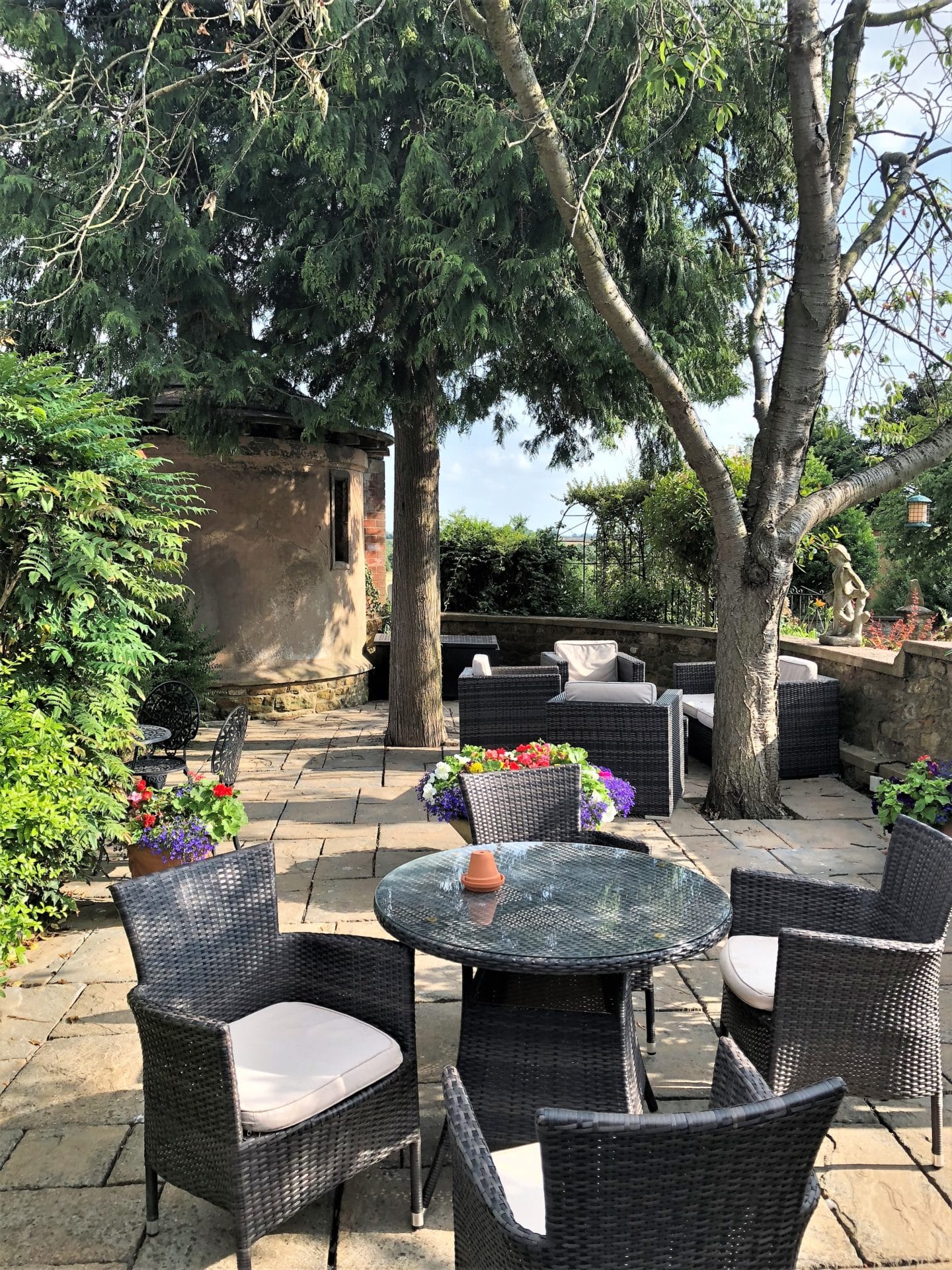 The summer house and gardens at Sysonby Knoll Hotel