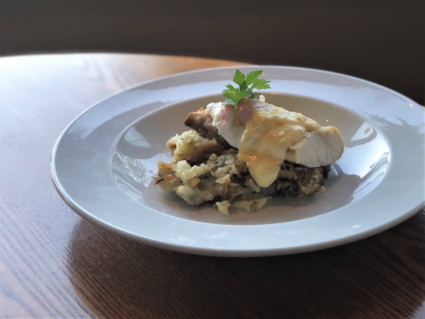Poached haddock with colcannon mash topped with a fried egg and hollandaise at Sysonby Knoll Hotel