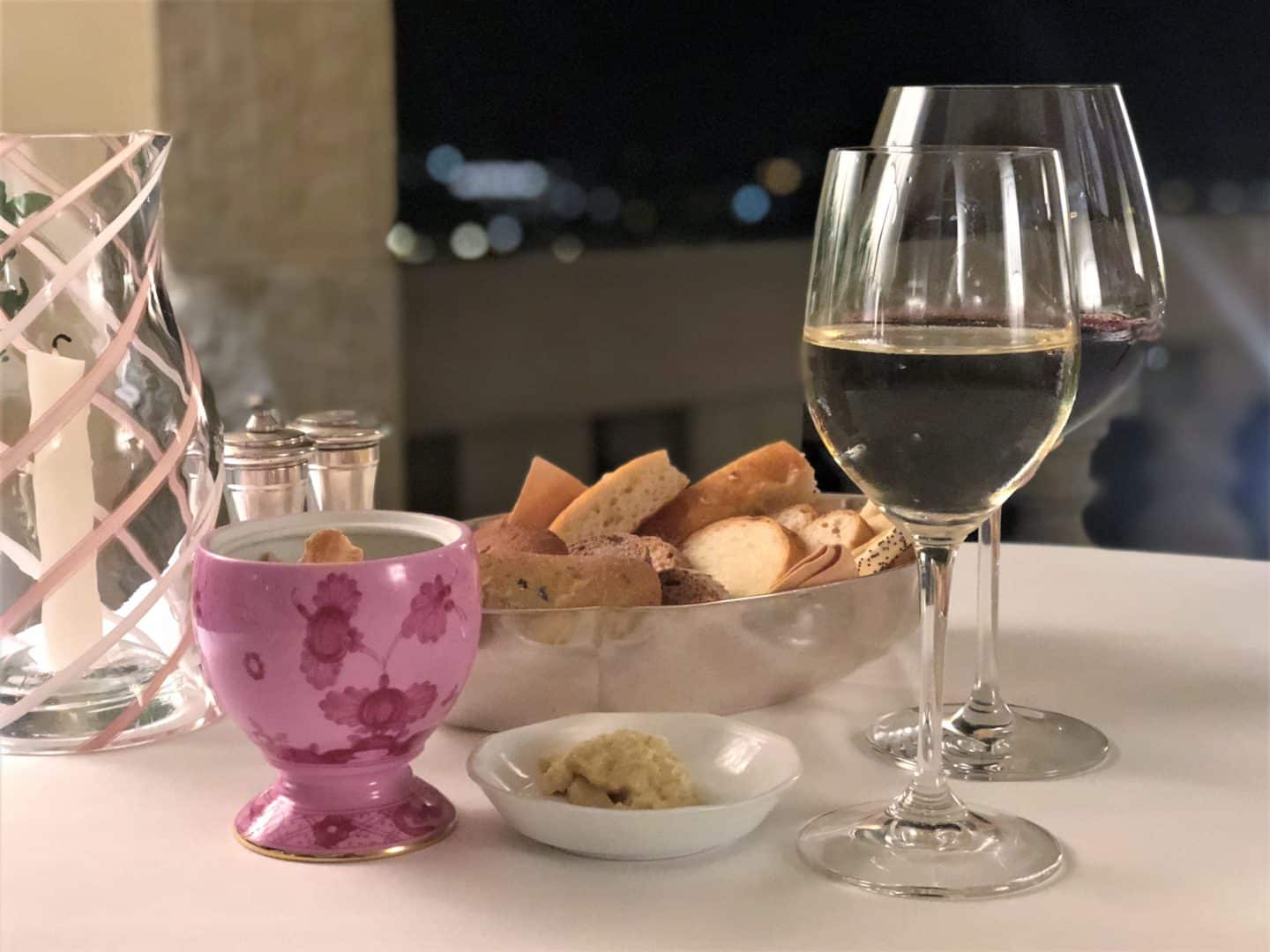 A stunning luxury hotel in Fiesole: glass ofred wine, bread and better 