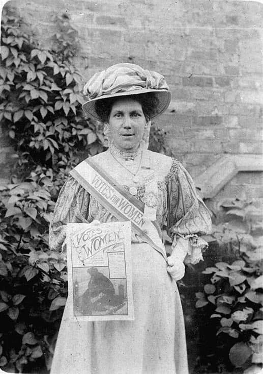 Alice Hawkins black and white photograph where she wears her suffragette sash