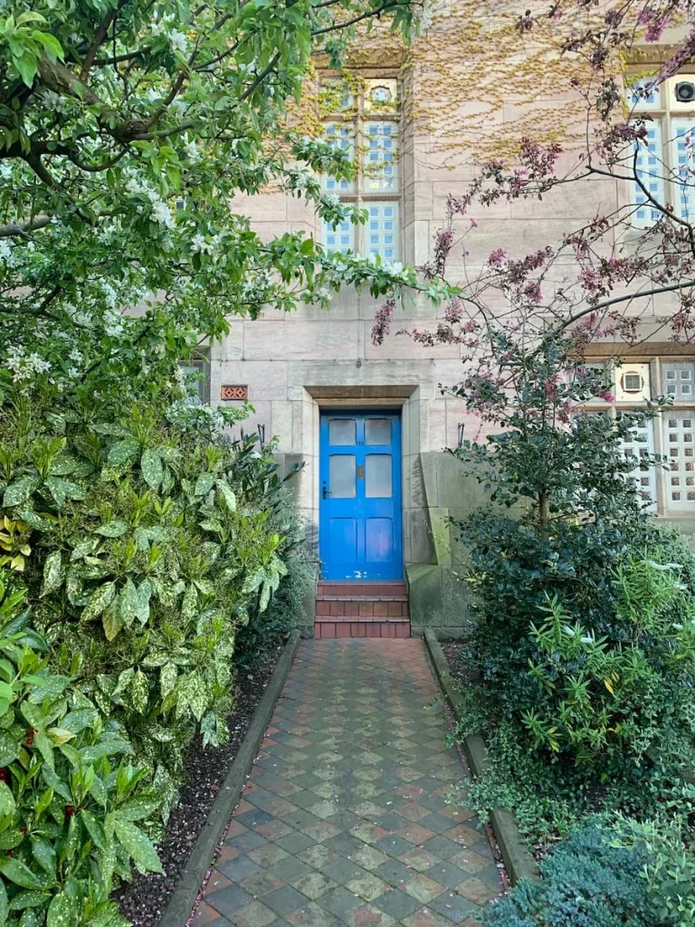Leicester prison blue side door makes a contrast from the turret castle-like structure