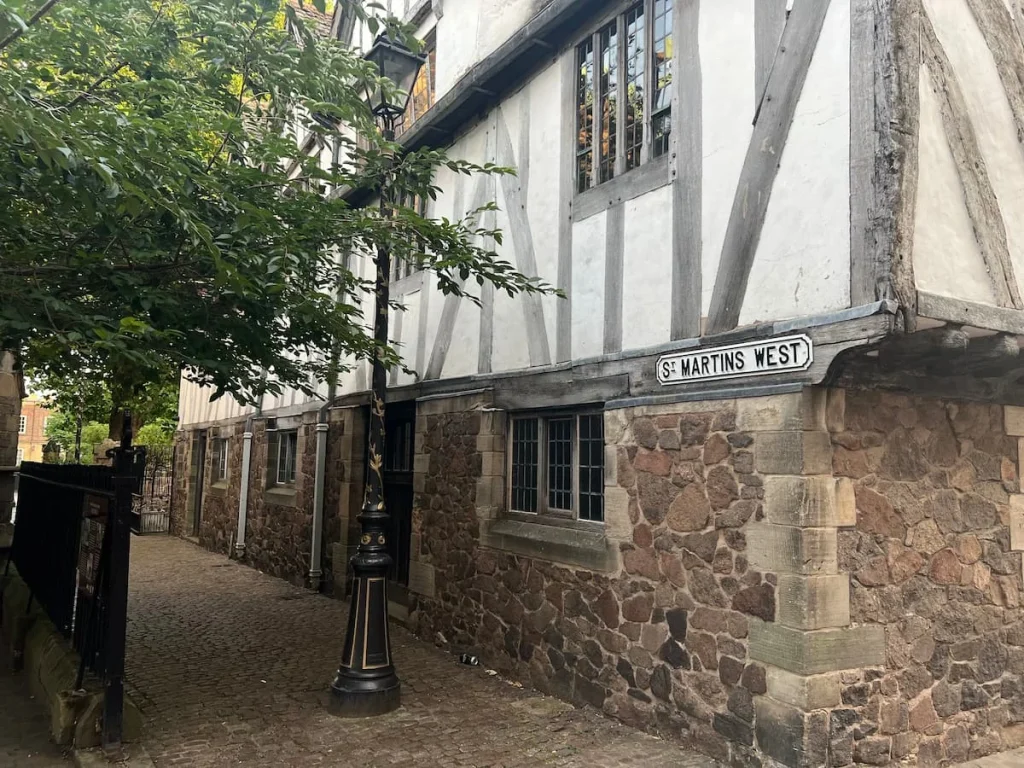 St Martin's West Lane with Leicester Guildhall in the background and a tree peaking in from the right hand side