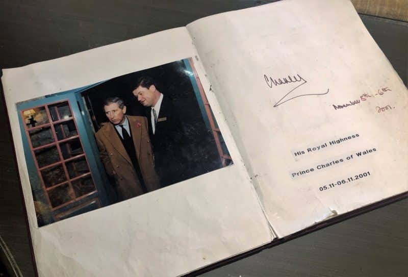 The Schlossle Hotel Tallinn HRH King Charles signature on a double page book in the reception area. 