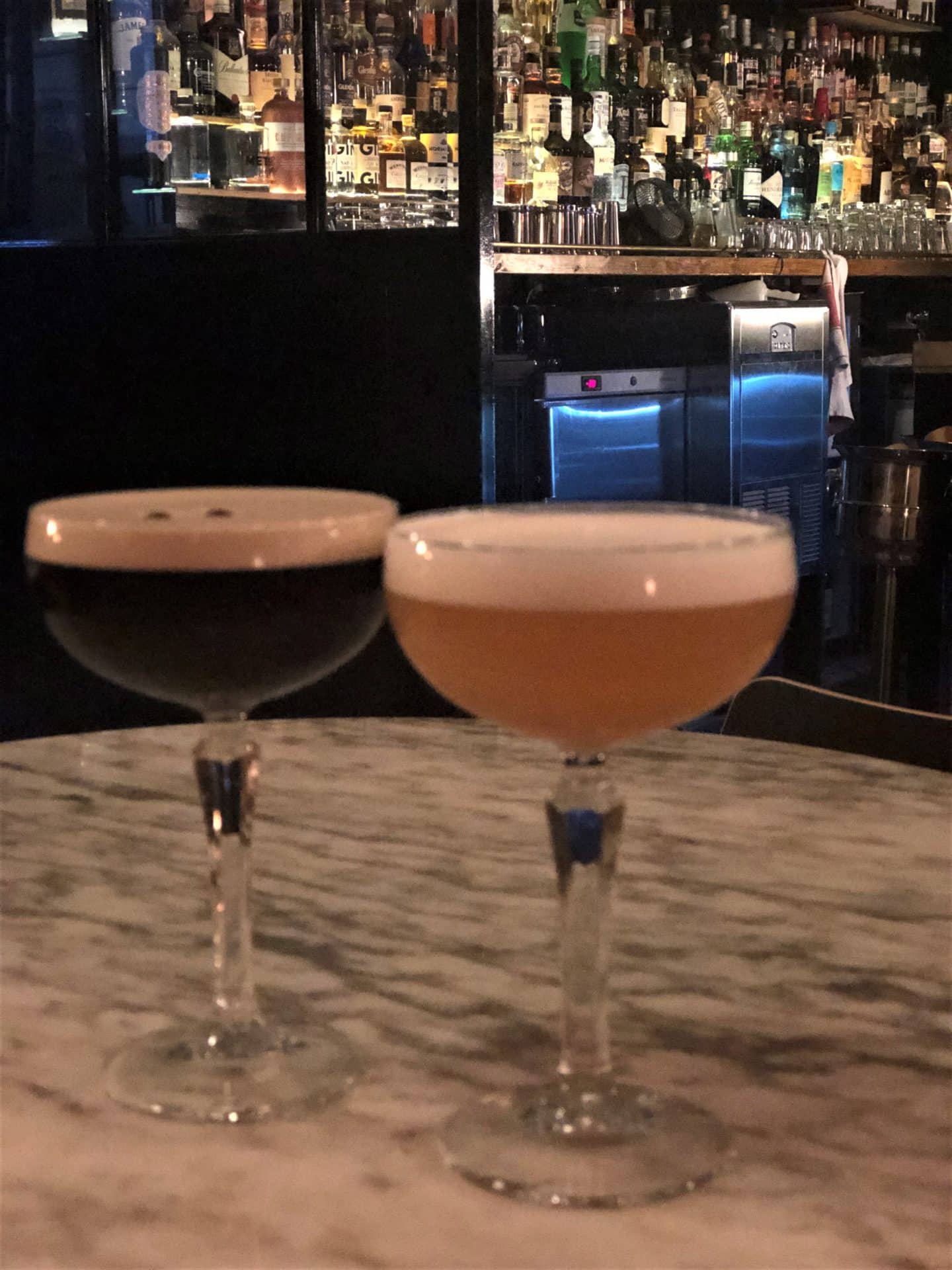 Pisco Sour and Espresso Martini at Frank Underground Bar in Tallinn with the bar area in the background
