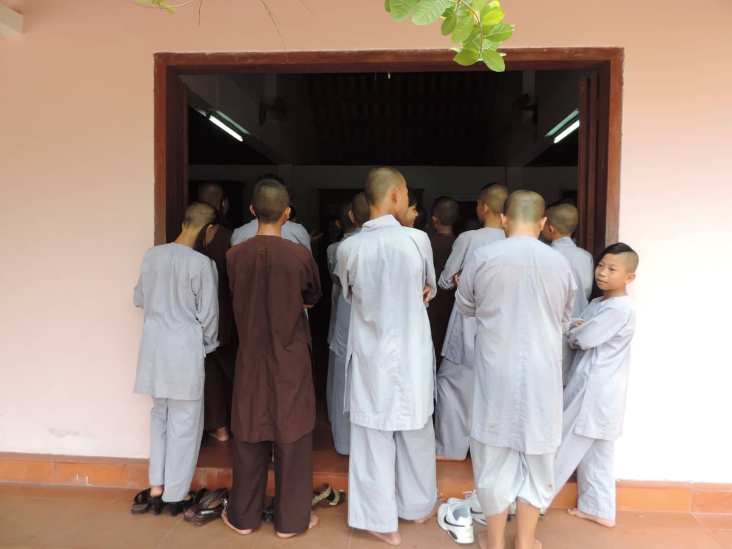 Athien Mu Pagoda Temple with novice monks gathered outside