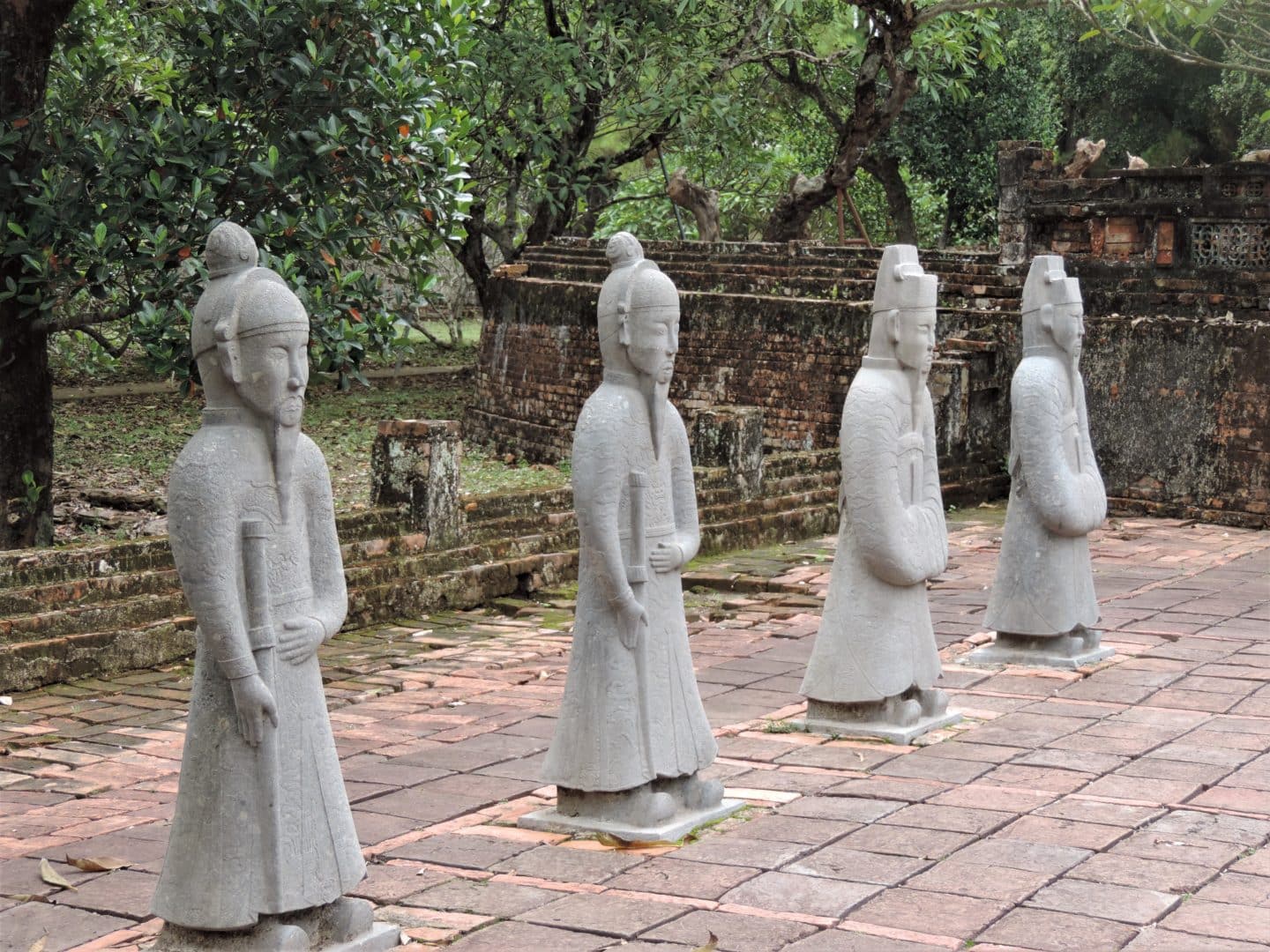 Tu Duc Kings Tomb stone statue warriors in a row at the tomb