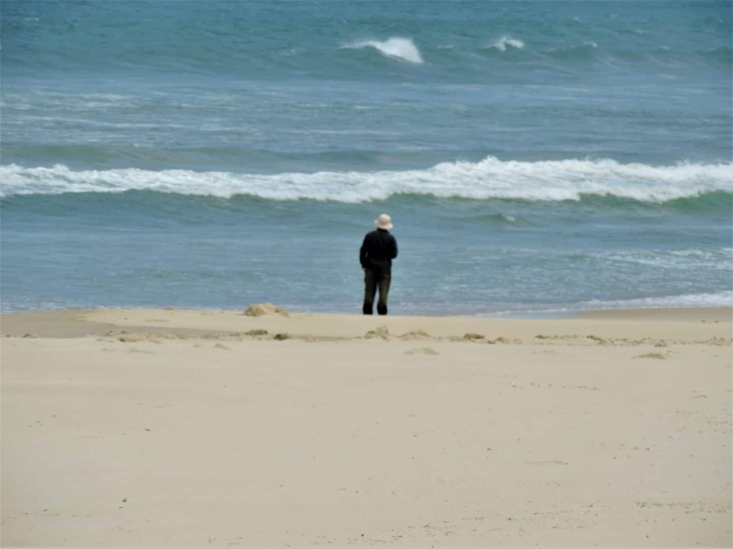 China Beach Da'nang with a man standing on the beach 