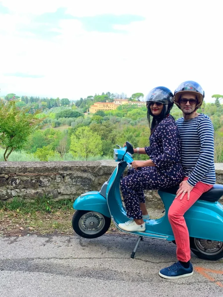 Vespa tour from Florence: bejal & Dr C on Vespa with Chianti backdrop