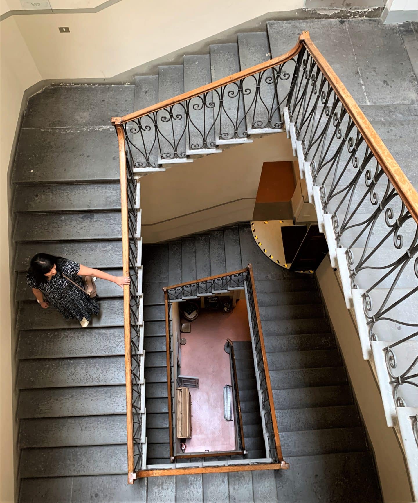 Soprarno Suites: A Beautiful Boutique Hotel in Florence, bejal walking down main staircase