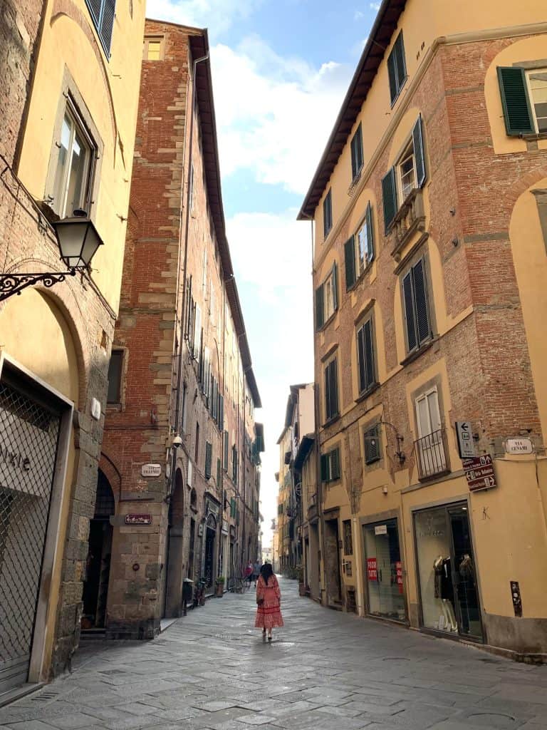 Street in Lucca with Bejal walking down