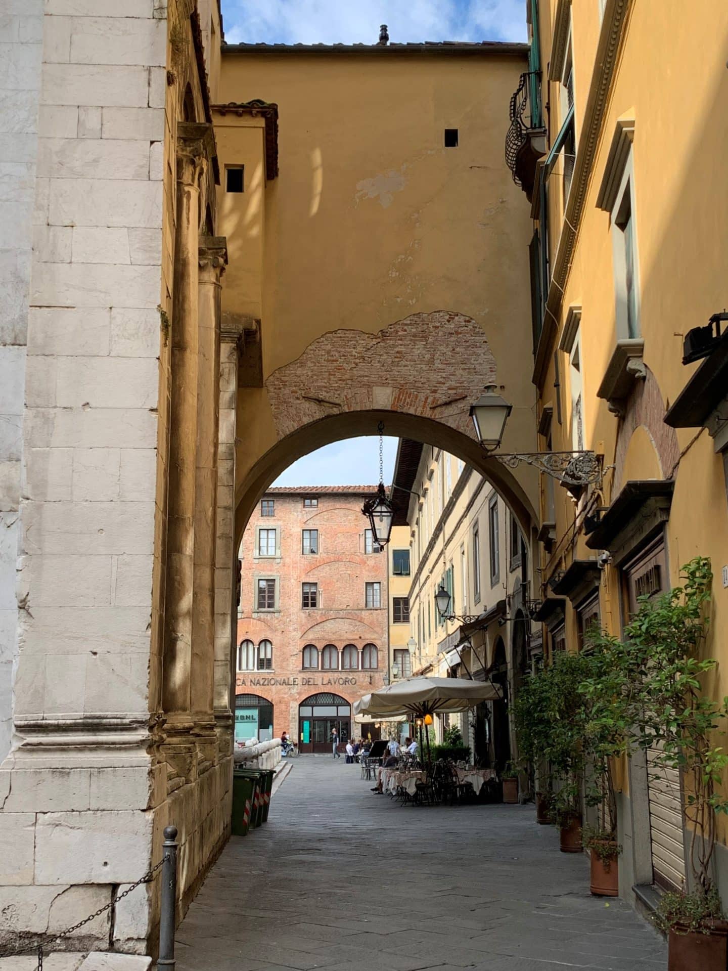 Archway into main square in lucca