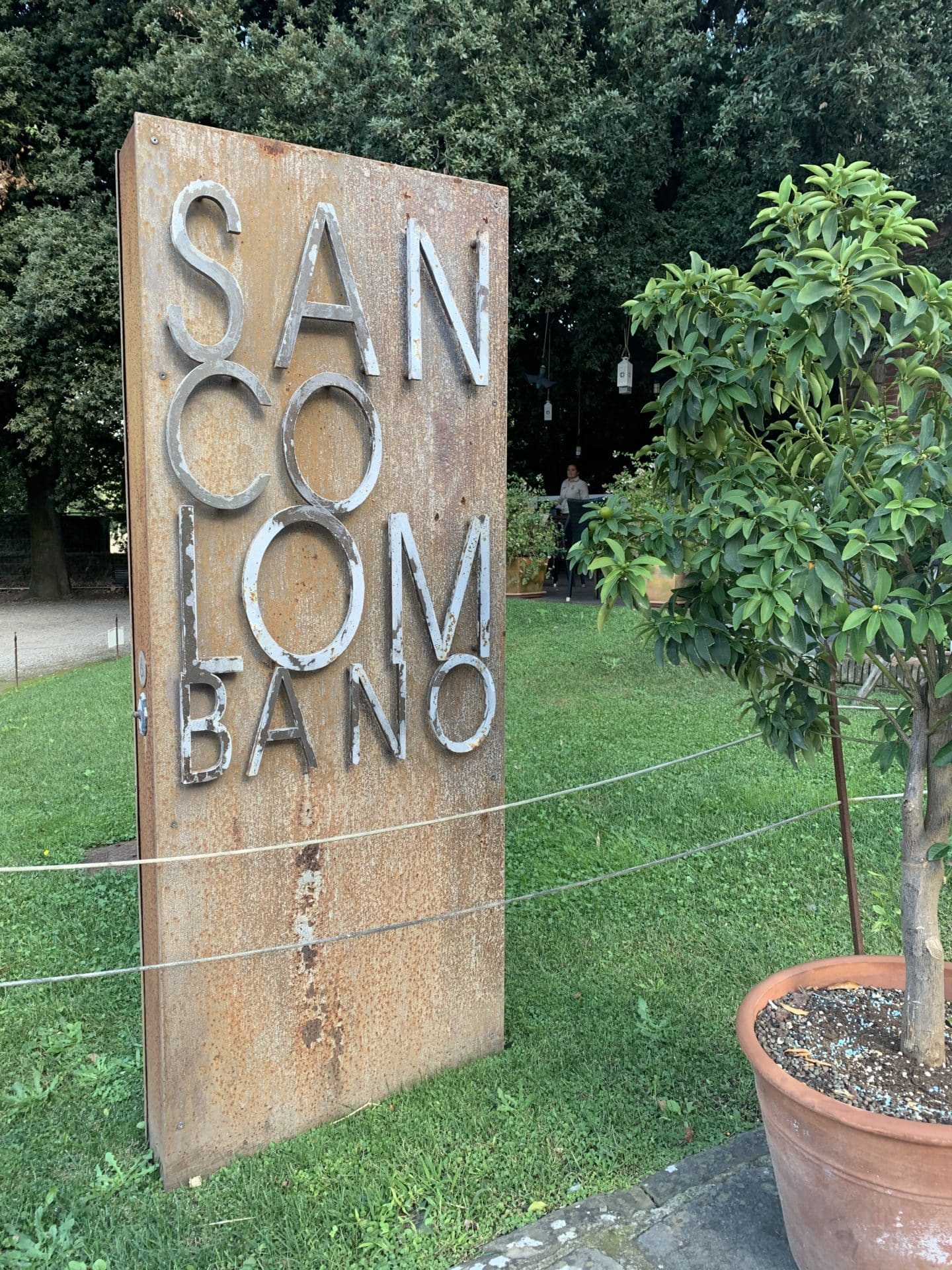 How to Spend a Day in Lucca, Tuscany Bar entrance on city walls walk