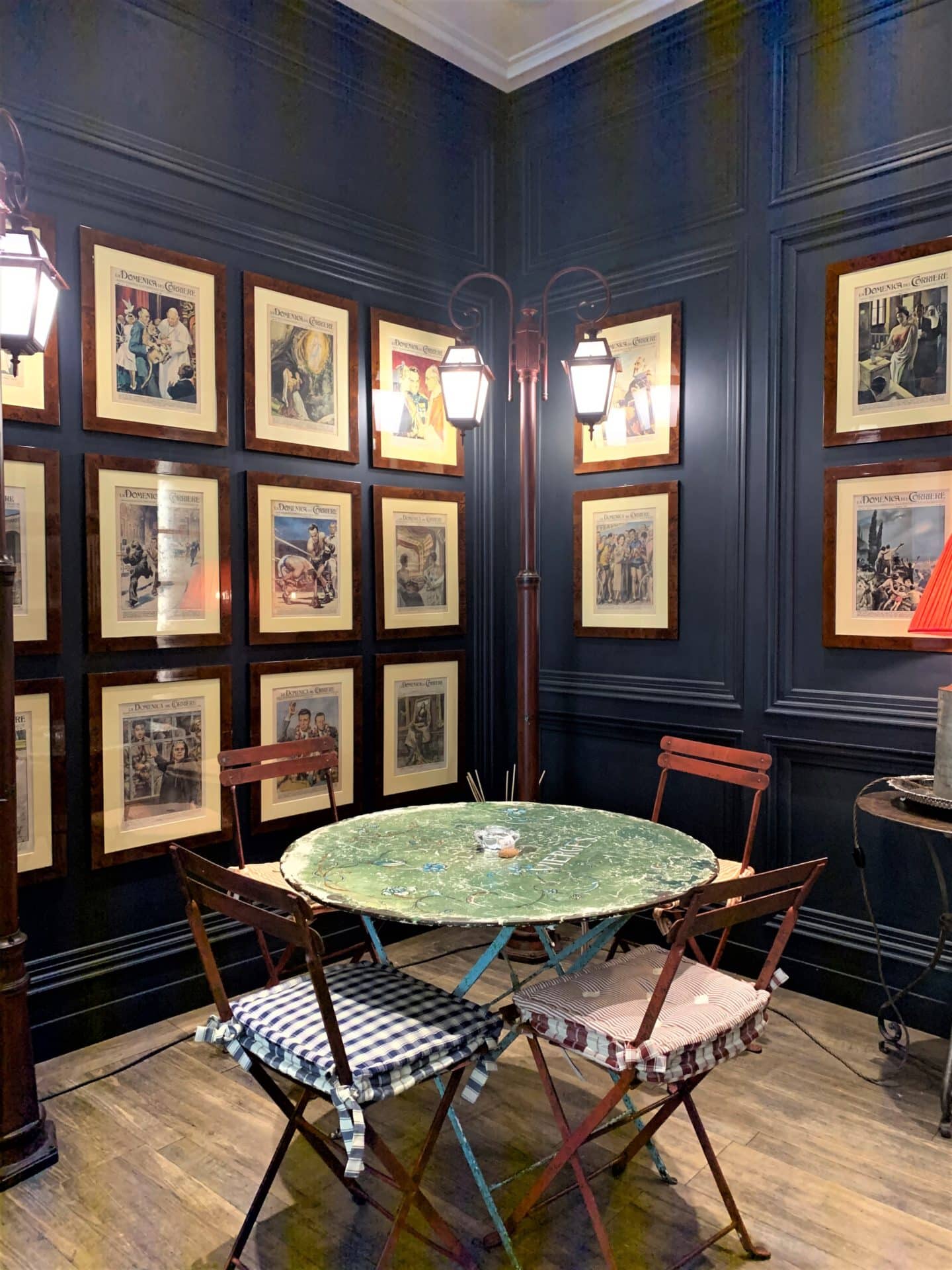 The interiors of Bistrot Cafe 1926 with photos on the walls,