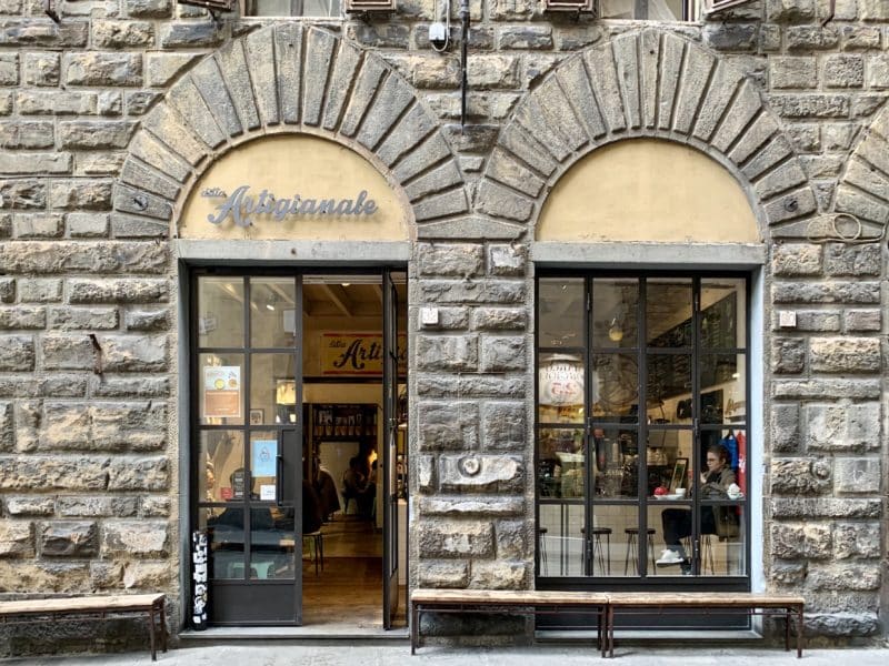 The exterior of Ditta Artiglianale cafe with its big oval windows