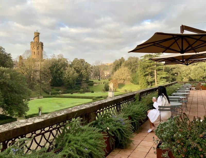 Bejal sitting on Adastra balcony with robe and morning coffee
