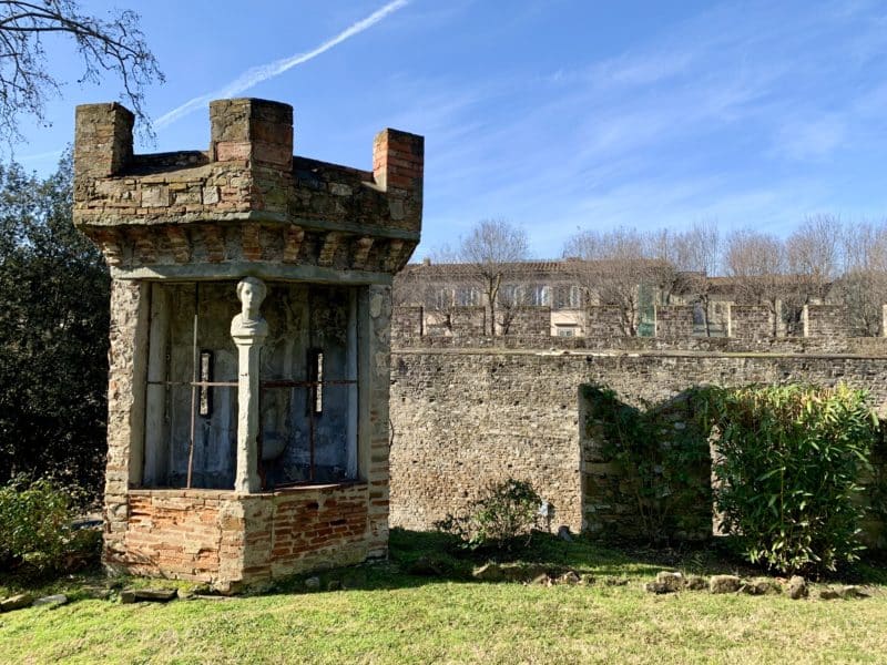 Turret and wall surrounding the hotel