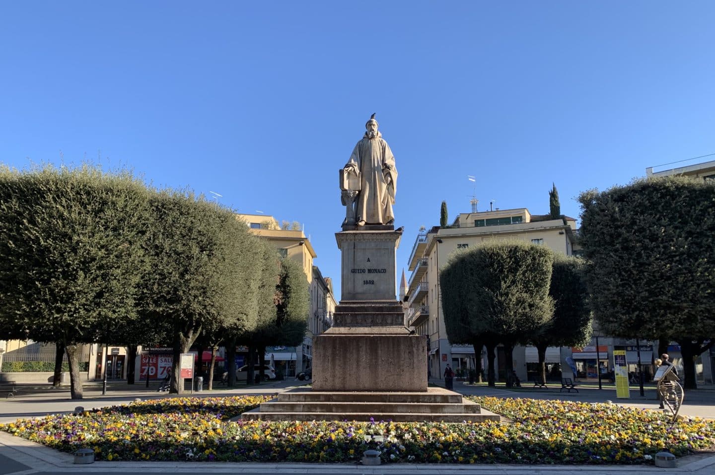 Arezzo Square outside the train station with statue.