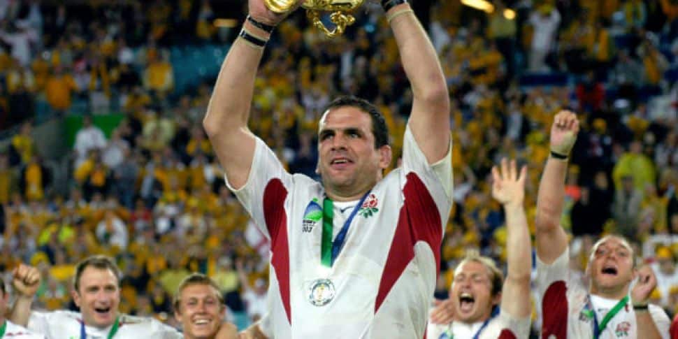 Famous People Associated with Leicester, Martin Johnson carrying Rugby World Cup