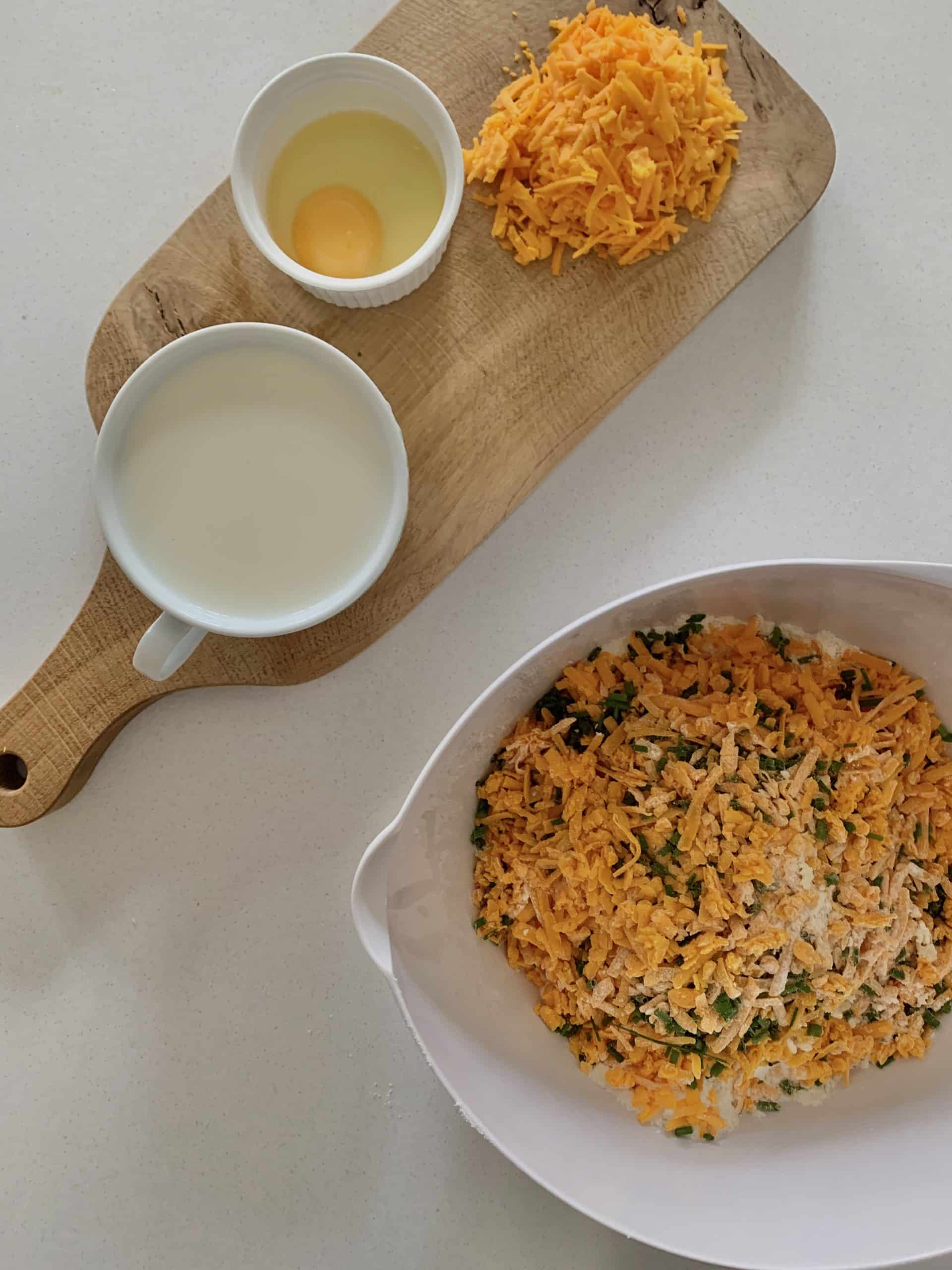 Red Leicester cheese scone mix in a bowl ready to be mixed