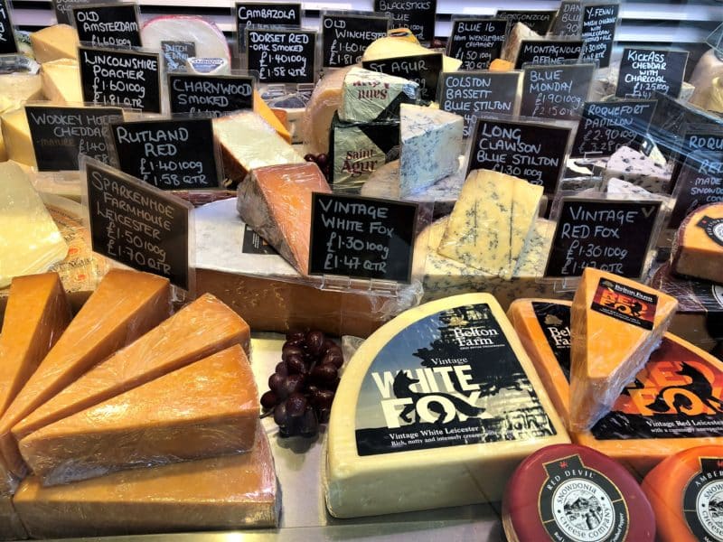Red Leicester Cheese packages in the fridge storage cabinet at Leicester Market