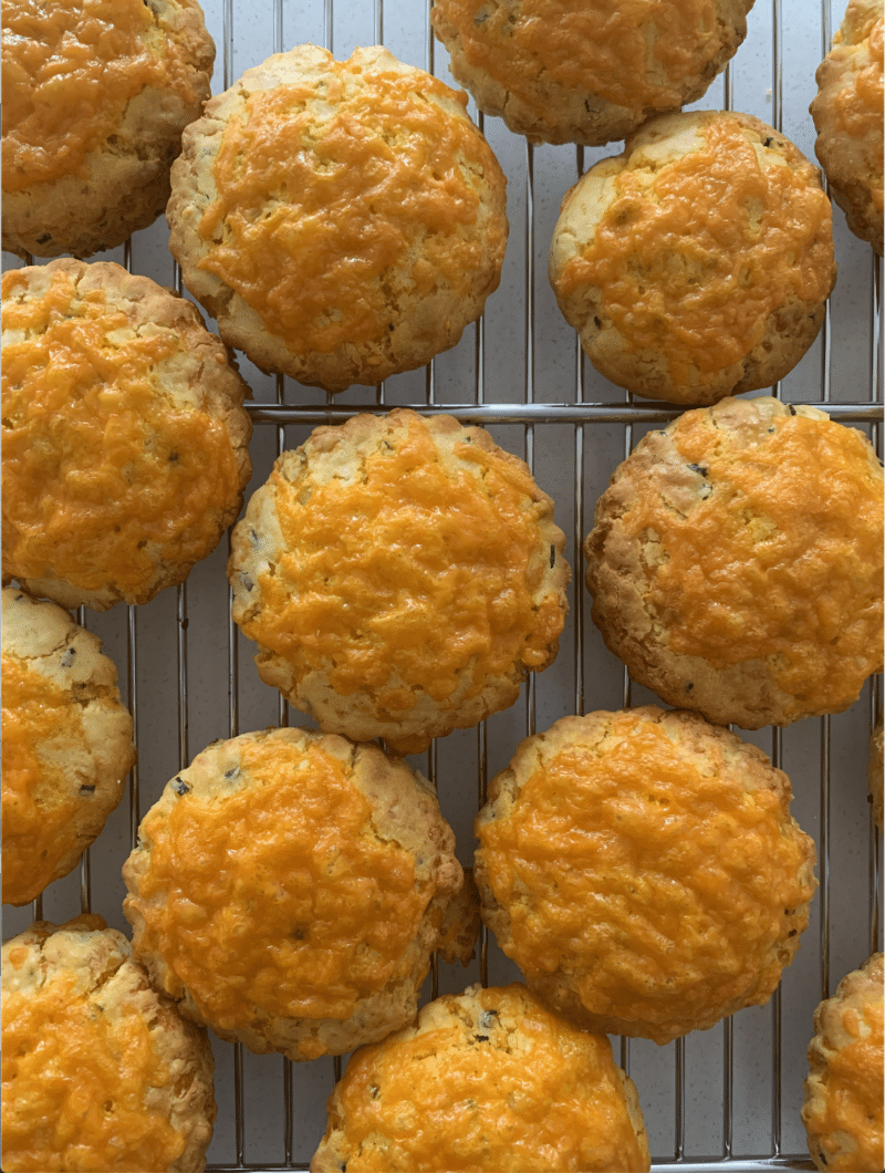 Scones just out of the oven with melted Red Leicester on top