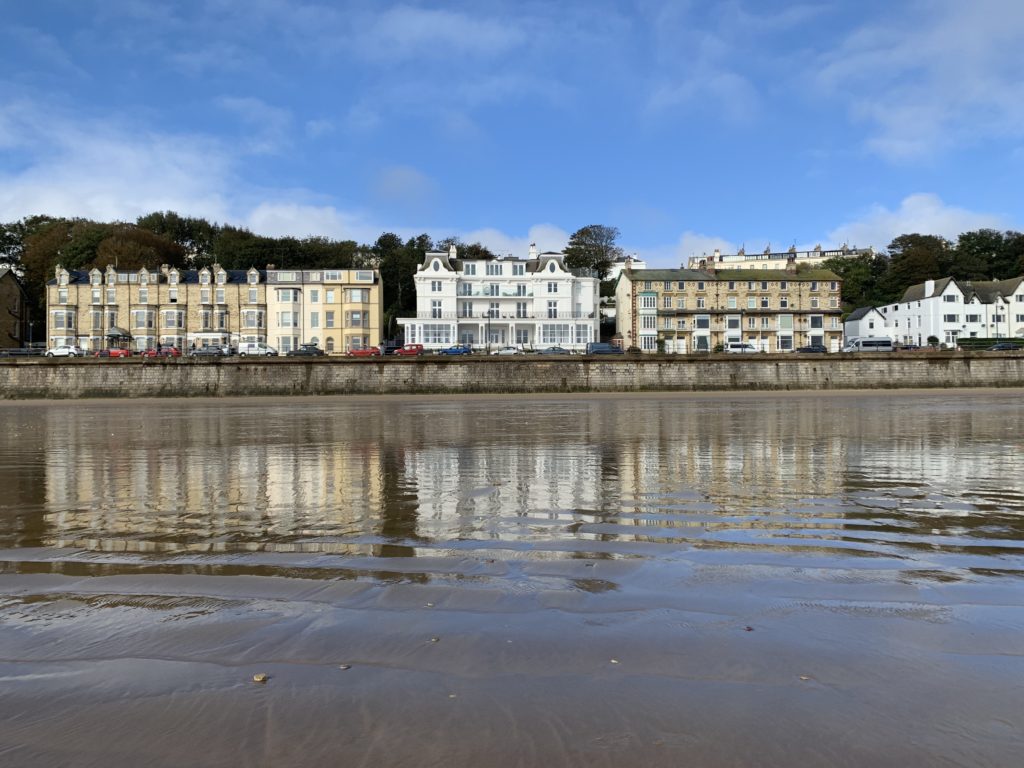 Filey seafront with three storwy houses facing the sea
