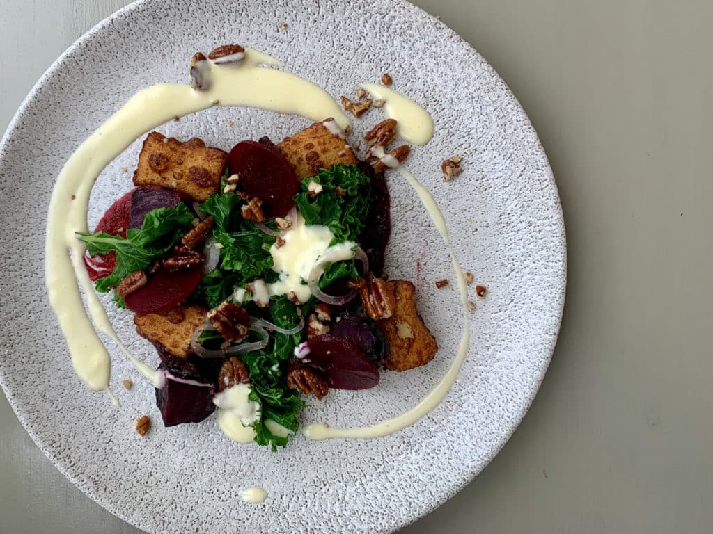 Top lay of Beetroot textures side view on a large white plate at The Wiveton Bell in Norfolk