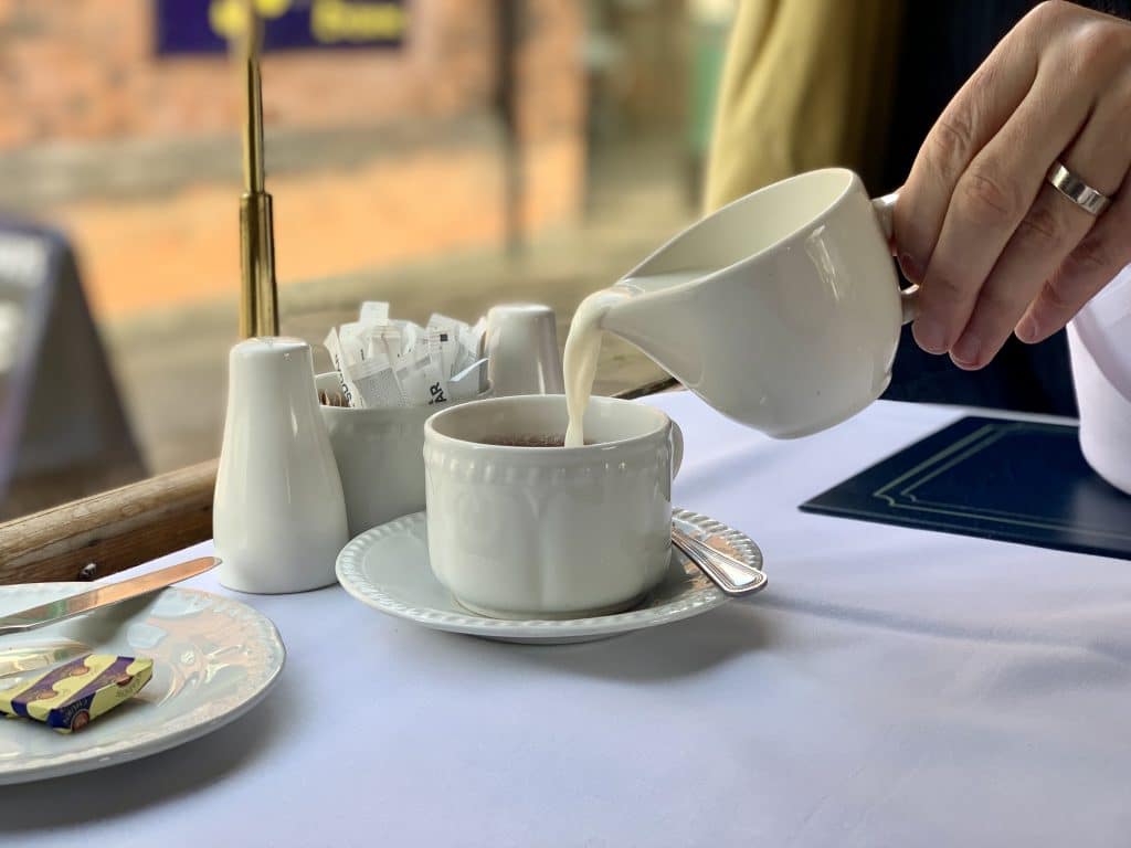 tea pouring on steam train