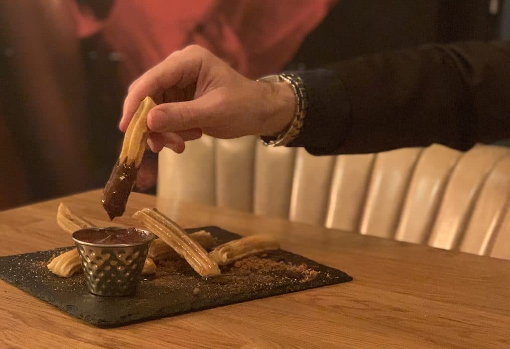 Best places to dine: El Pescuador cgurros with chocolate sauce